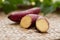 Japanese sweet potato on weave basket and leaf background