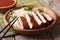 Japanese tonkatsu breaded deep fried pork with cabbage and sauce