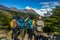 Japanese tourists enjoy  view of Cerro Torre Mountain at the Laguna Torre trek in the Los Glaciares National Park