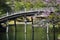 Japanese traditional garden, wooden bridge.