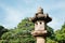 Japanese traditional stone lantern at Rikugien Gardens in Tokyo, Japan