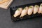 Japanese traditionanigiri made with raw fish and wasabi