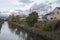 Japanese train travel along the river in Kyoto