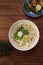 Japanese udon dishes sprinkling soup stock to noodles directly