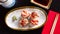 Japanese uramakizushi rolls with salmon, avocado and unagi sauce
