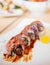 Japanese Wagyu beef sushi maki rolls on ceramic plate
