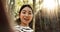 Japanese woman, selfie and bamboo forest for portrait with smile, pride and bush for post on web blog. Girl, person and