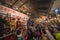 Japanese women in kimono doing a lottery with the crowd of Tori-no-Ichi Fair at Ootori shrine.