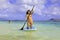 Japanese women on paddleboards