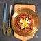 Japchae, Stir Fry Korean Glass Noodle on Golden Plate
