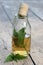 Jar with alcohol tincture and nettle leaves