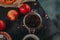 A jar of fragrant black coffee, food photo. Apples and garland at the table.