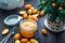 Jar of Homemade Marmalade with Kumquats and Green Plant on Dark Wooden Table