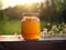 A jar of honey sitting on top of a wooden table. AI generative image.