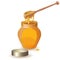 Jar of honey with wooden dipper