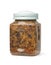 Jar of organic bees comb capping mixed with raw honey, propolis and pollen
