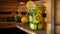 A jar of refreshing cucumber and lemon water sits on a shelf in a sauna encouraging guests to hydrate throughout their