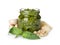 Jar of tasty pesto sauce and ingredients isolated