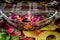 A jar is which is loaded with rose and candle on indian festival diwali deepawali with fire  on table