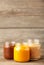 Jars of baby puree on grey wooden background