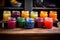 jars of colorful homemade jams on rustic wooden table