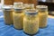 Jars of corn kernels waiting to go in the pressure canner.