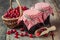 Jars of cranberries jam and basket with bog berry