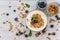 Jars full with granola, yogurt and fresh berries, top view, selective focus