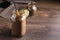 Jars of instant coffee and spoon on table. Space for text