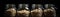Jars Of Oatson Black Background Wde Panoramic. Generative AI