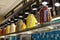 Jars of pickles and marinades on counter of  grocery store