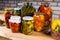 Jars of Preserved Vegetables on Wooden Table