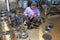 JAVA, INDONESIA - DECEMBER 21, 2016: Worker making kitchen utensils in a factory on Java Indonesia 21th december 2016.