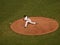 Javier Lopez throws pitch ball flying in the air