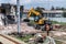 JCB excavator demolishes an old building