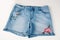 Jean shorts with floral embrodiery isolated