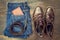 Jeans, belt , shoes and wallet on wooden background