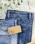 Jeans with empty craft label, textile bag and hanger