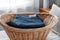 Jeans folded in laundry basket