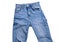 Jeans isolated on white, denim pants isolated, folded blue jeans isolated on white, summer clothes, cloth element mock up