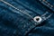 Jeans rivet on blue denim jeans with copy space