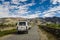 Jeep Caravan cars on road with View of Zanskar