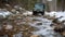 a jeep drives through some rocky water way, near rocks