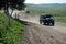 Jeep driving on the road