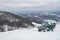 Jeep in mountain in winter