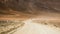 Jeep riding on road of Bolivian desert