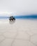 Jeep in the salt lake salar de uyuni