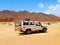 Jeep stopped in the desert of the Sinai Peninsula. Red Sea coast and adventure routes through the Dahab desert