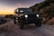 Jeep Wrangler on a dirt road