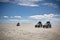 Jeeps in the landscape of the Salar de Uyuni and lagoons like La